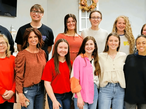 Rotary-Travel-Photo-1 People standing in front of church auditorium